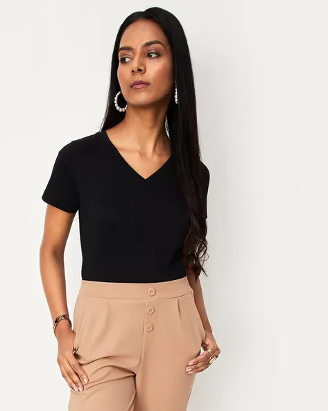 473Wx593H-466225786-black-MODEL.webp Women Fitted V-Neck T-Shirt - Image 1